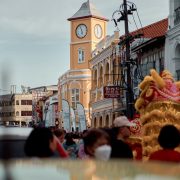 Clock tower and street life in Phuket Town
