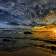 Sunset over the Andaman Sea with a rocky island