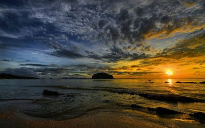 Sunset over the Andaman Sea with a rocky island